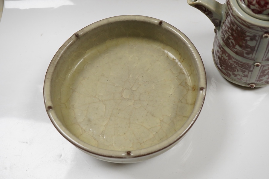 A Chinese underglaze copper red ewer and cover and a crackle glaze tripod dish, 17.5cm high